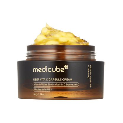 Medicube Deep Vita C Capsule Cream jar with cream on top on a white background