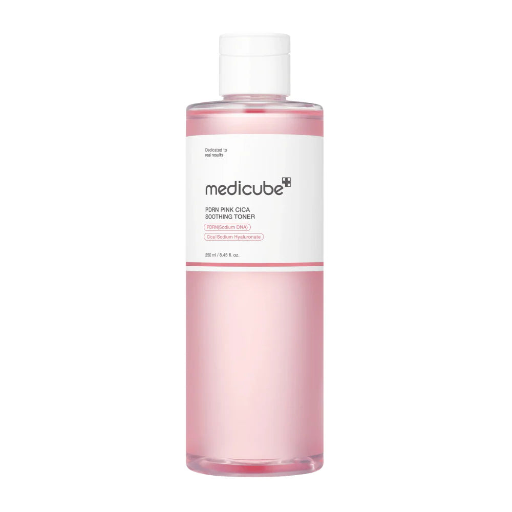 Pink bottle of Medicube toner on a white background